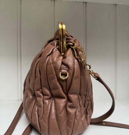 Miu Miu kiss lock crossbody bag