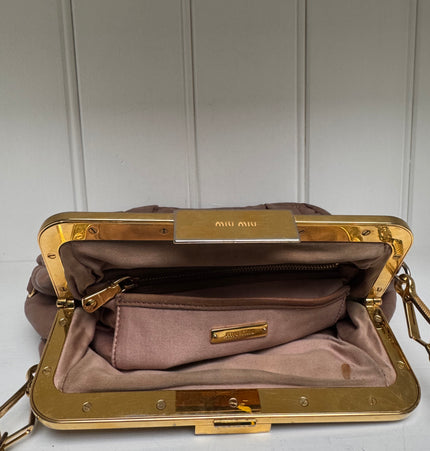 Miu Miu kiss lock crossbody bag