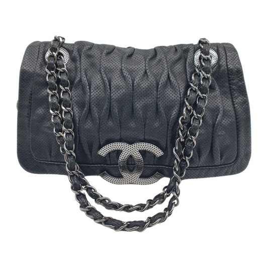 Chanel crossbody perforated flap bag