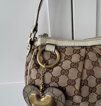 Gucci GG Canvas Shoulder Bag with Heart Charm