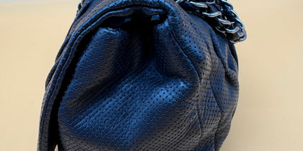 Chanel crossbody perforated flap bag