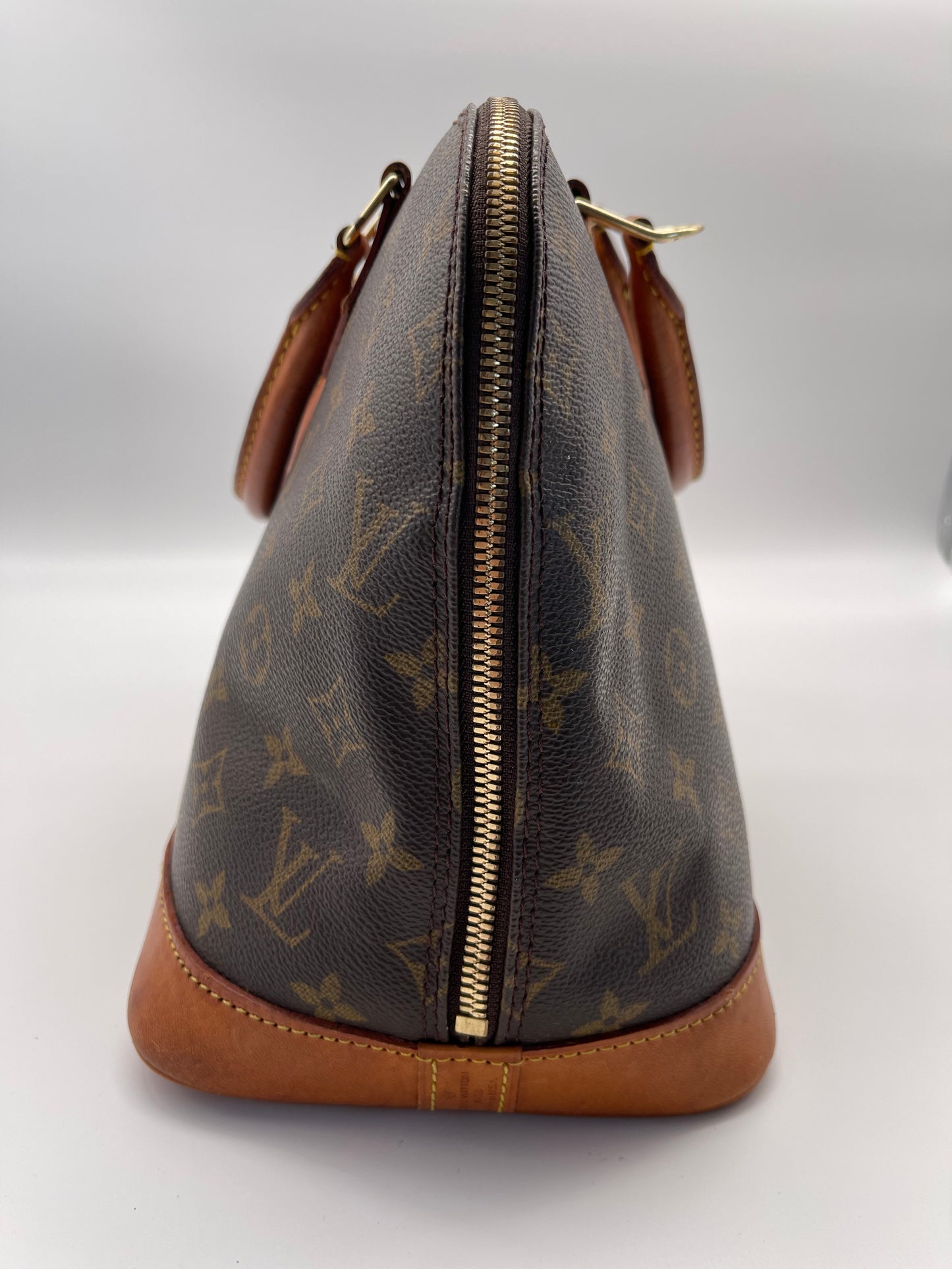 Louis Vuitton alma monogram canvas handbag