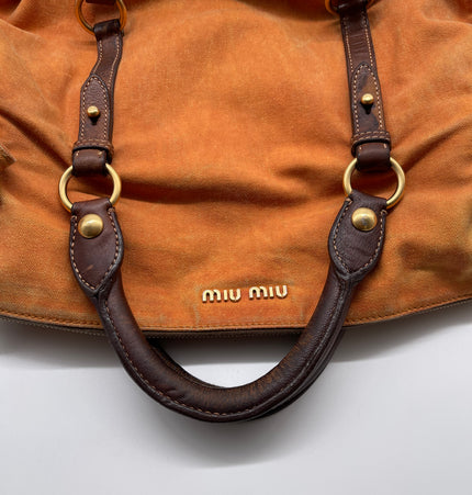 miu miu bow handbag in denim and leather trim