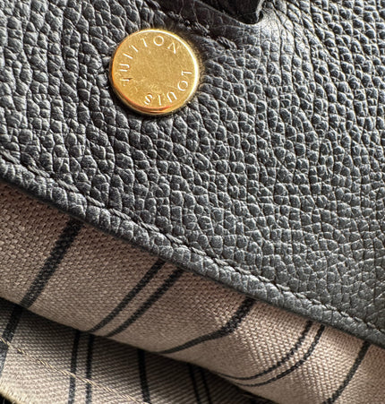 Louis Vuitton emperiente handbag