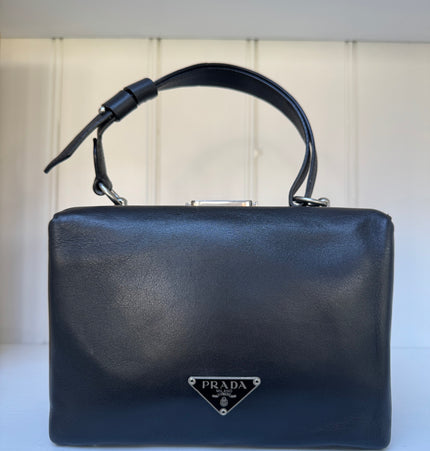 Prada top handle kiss lock handbag