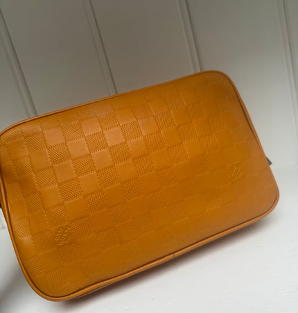 Louis Vuitton leather toiletries bag