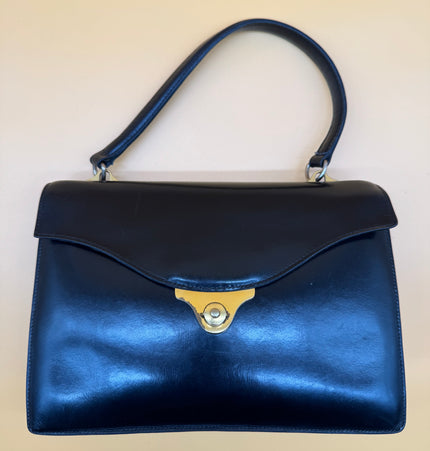 Sac à main vintage en cuir HERMÈS