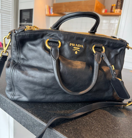 Prada double zipper leather bag
