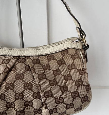 Gucci GG Canvas Shoulder Bag with Heart Charm