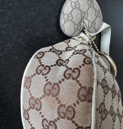 Gucci GG Canvas Shoulder Bag with Heart Charm