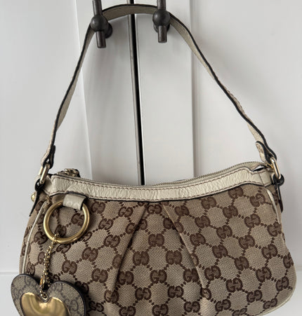 Gucci GG Canvas Shoulder Bag with Heart Charm