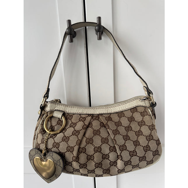 Gucci GG Canvas Shoulder Bag with Heart Charm