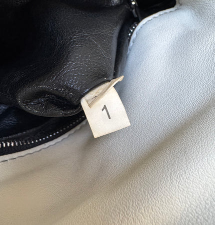 Sac bandoulière Prada à chaîne et rivets