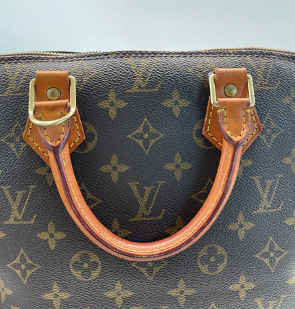 Sac à main Louis Vuitton Alma en toile monogrammée