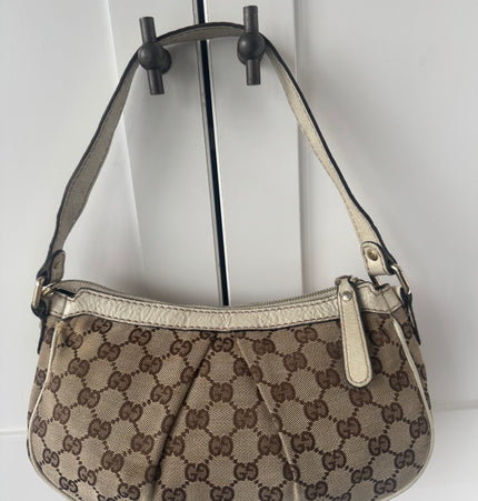 Gucci GG Canvas Shoulder Bag with Heart Charm