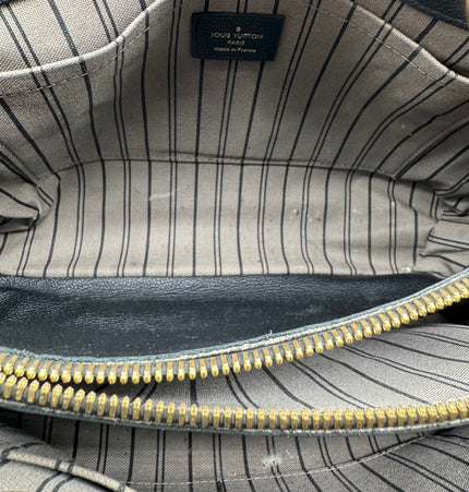 Louis Vuitton emperiente handbag