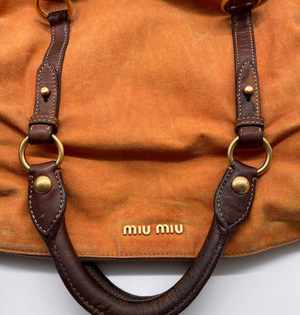 miu miu bow handbag in denim and leather trim