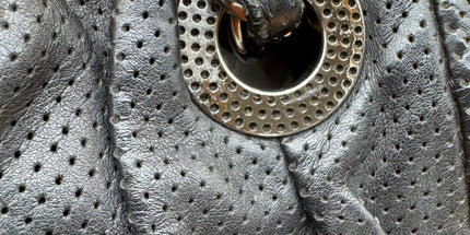 Chanel crossbody perforated flap bag