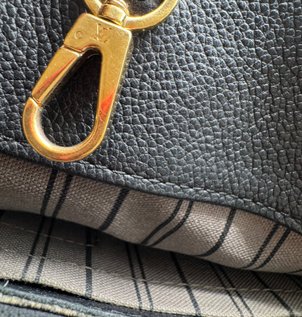 Louis Vuitton emperiente handbag