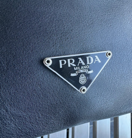 Prada top handle kiss lock handbag
