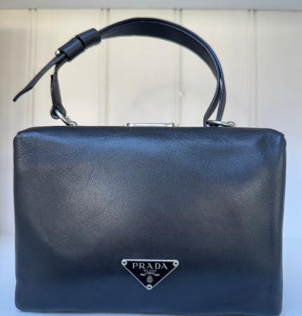Prada top handle kiss lock handbag