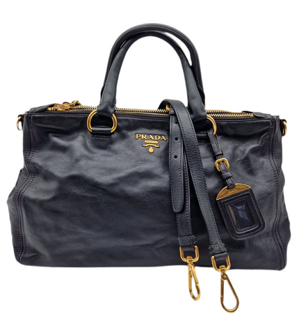 Prada double zipper leather bag
