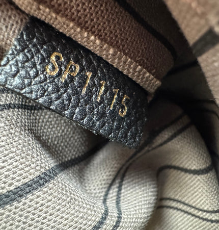 Louis Vuitton emperiente handbag