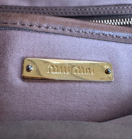 Miu Miu kiss lock crossbody bag