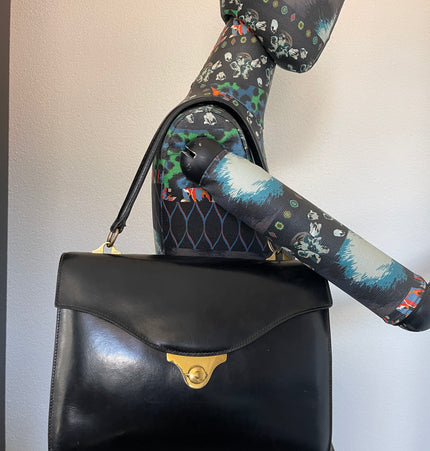 Sac à main vintage en cuir HERMÈS