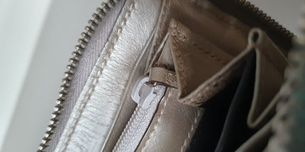 Gucci silver coated canvas wallet