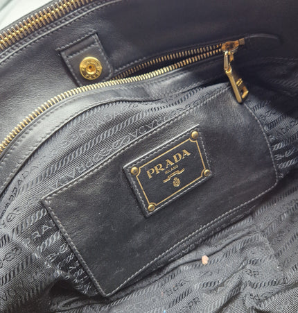 Prada double zipper leather bag