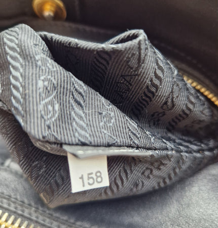 Prada double zipper leather bag