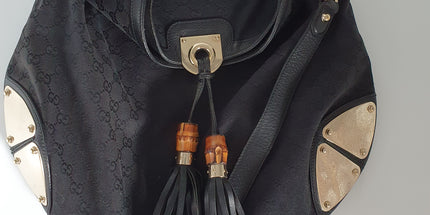 Gucci Indy cloth bag with tassle
