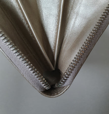 Gucci silver coated canvas wallet