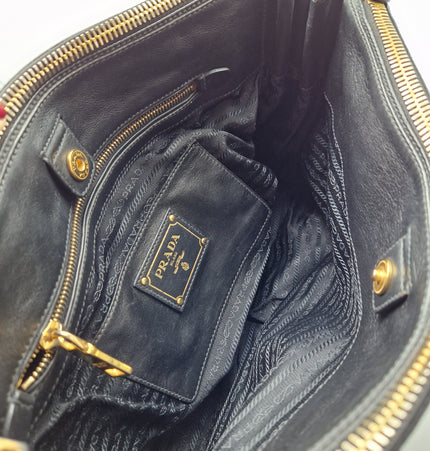 Prada double zipper leather bag