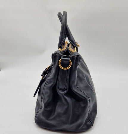 Prada double zipper leather bag