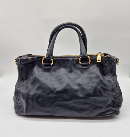 Prada double zipper leather bag