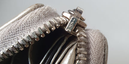 Gucci silver coated canvas wallet