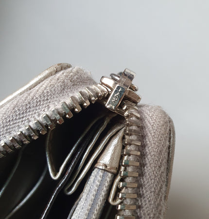 Gucci silver coated canvas wallet