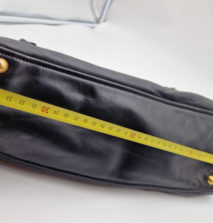 Prada double zipper leather bag