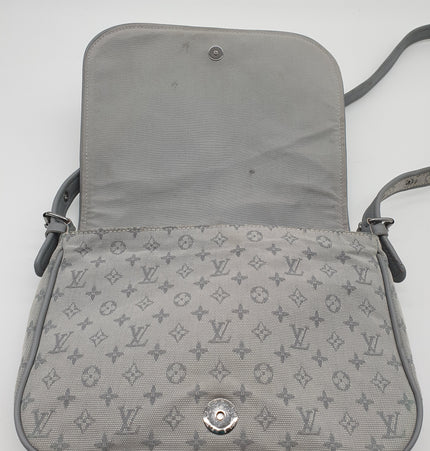 Louis vuitton cont de fees crossbody bag