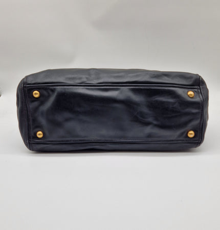 Prada double zipper leather bag