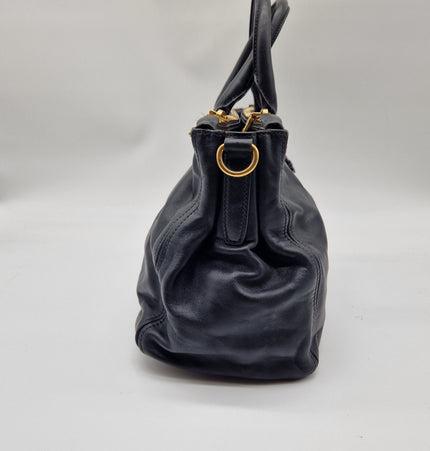 Prada double zipper leather bag