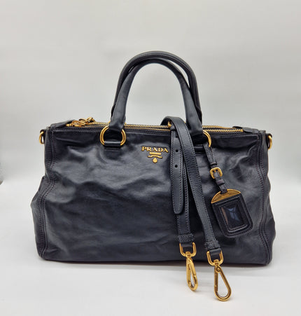 Prada double zipper leather bag