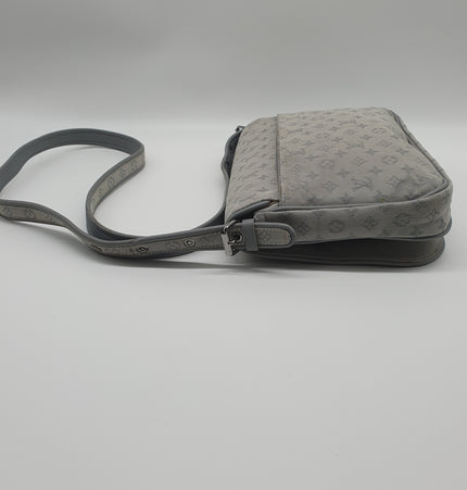 Louis vuitton cont de fees crossbody bag