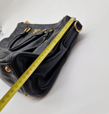 Prada double zipper leather bag