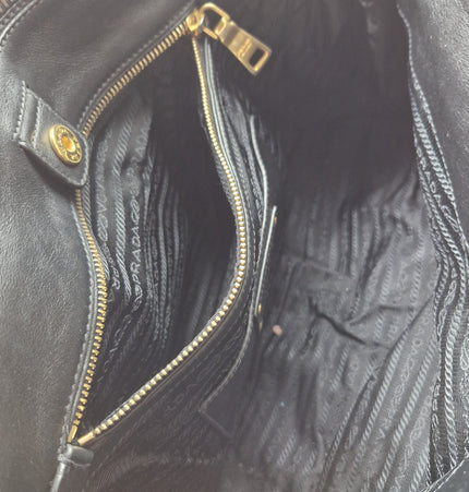 Prada double zipper leather bag