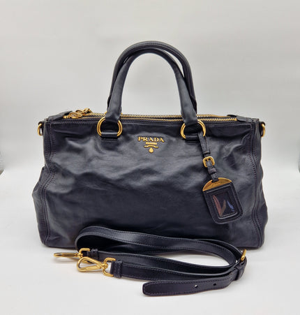Prada double zipper leather bag