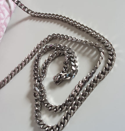 Dior trotter pouch with added chain strap